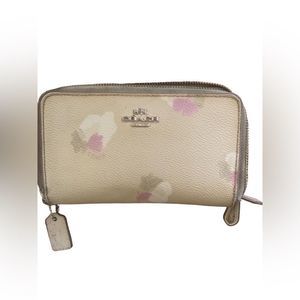 Coach leather  floral wallet.